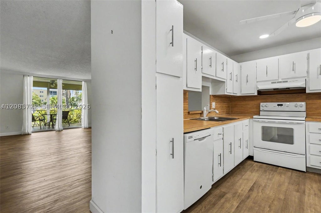 Photo of 414 SE 10th St #103, Dania Beach, FL 33004 (MLS # A12085722)