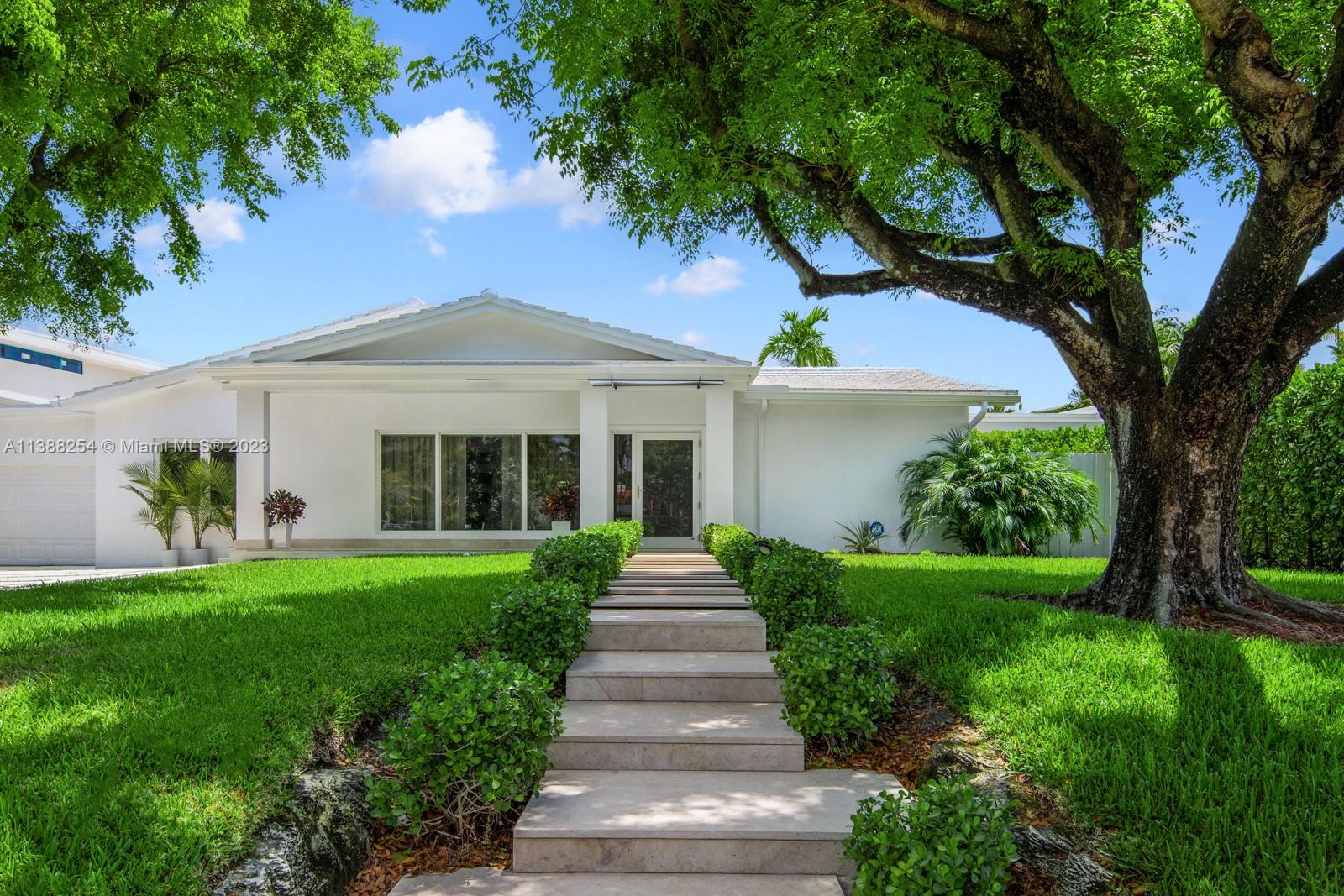 Fully renovated waterfront home in Miami's exclusive guard gated neighborhood of Belle Meade. Enjoy direct water access to Biscayne Bay with no bridges! This one of a kind property sits on a 12,739 SqFt lot with 55 ft of water frontage great for any boater.
The gorgeous 3 bdrm, 3 1/2 bath includes a master stateroom with terrace access and garden/pool view. Modern architecture with an amazing layout that is great for entertaining, offering a large open kitchen and living space, heated pool, large covered summer kitchen area, private driveway and enclosed garage.
Minutes away from Design District and Miami's top rated private schools.