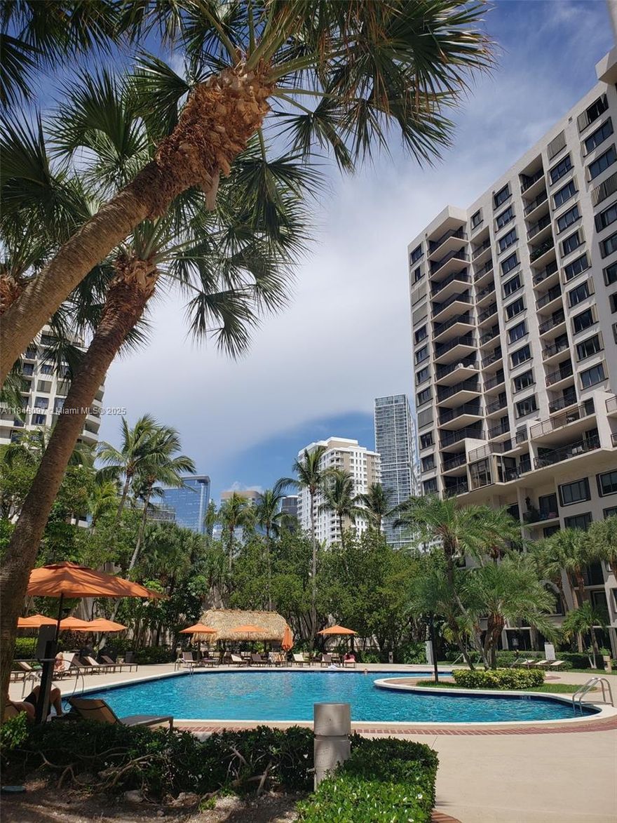 Indulge in the Brickell Key Island lifestyle owing this spectacular 1bed 1.5bath condo with beautiful water views from the 15th floor. Tile floors throughout, spacious living/dining room area with lots of light. Building located in one of Miami's most exclusive islands communities, steps from Brickell financial district, world class shopping, dining and entertainment.  Building's amenities include heated pool, jacuzzi, gym, dry sauna, tennis courts, racquetball, children's playroom, renovated lobby, concierge, security and valet parking. Island offers private park, scenic maritime promenade.