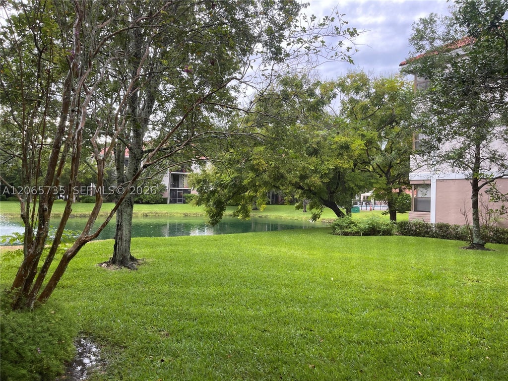Photo of 10101 W Sunrise Blvd #106, Plantation, FL 33322 (MLS # A12065735)