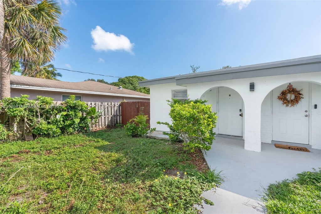 Photo of 308 NW 2nd Ave #N, Deerfield Beach, FL 33441 (MLS # A11899874)