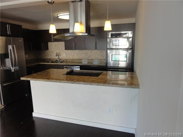 Check out this fully remodeled 2 bedroom 2 bathroom unit with Den and a beautiful Biscayne Bay view!! Includes stainless steel appliances, granite counter tops, Italian custom kitchen cabinets, bamboo wood floors, walk-in closet, laundry in unit, freshly painted, fully remodeled bathrooms. Condo offers a bundle of amenities, full fitness center, study area, pool, basketball courts, tennis courts, bbq area, small commercial shops on first floor, 24/7 Lobby security. Located in prime location, minutes from Wynwood, Design District, Brickell, Miami Beach, Easy access to highway.