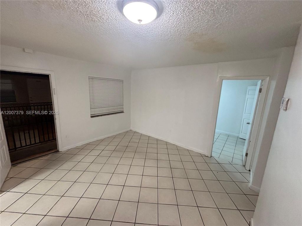 Photo of 7841 Johnson St #203, Pembroke Pines, FL 33024 (MLS # A12007379)