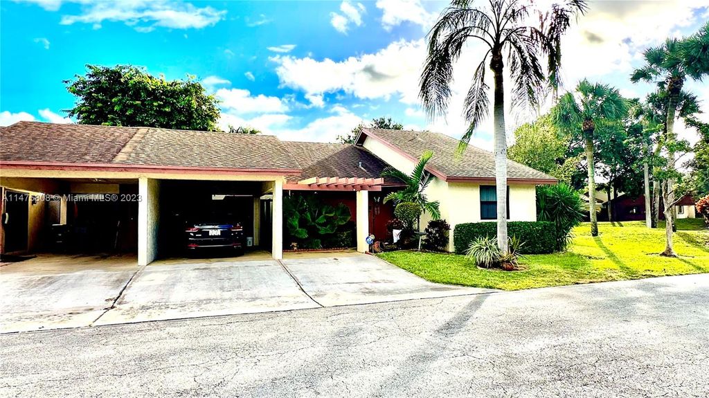 Photo of 1794 Maplewood Trl, Coconut Creek, FL 33063 (MLS # A11475808)