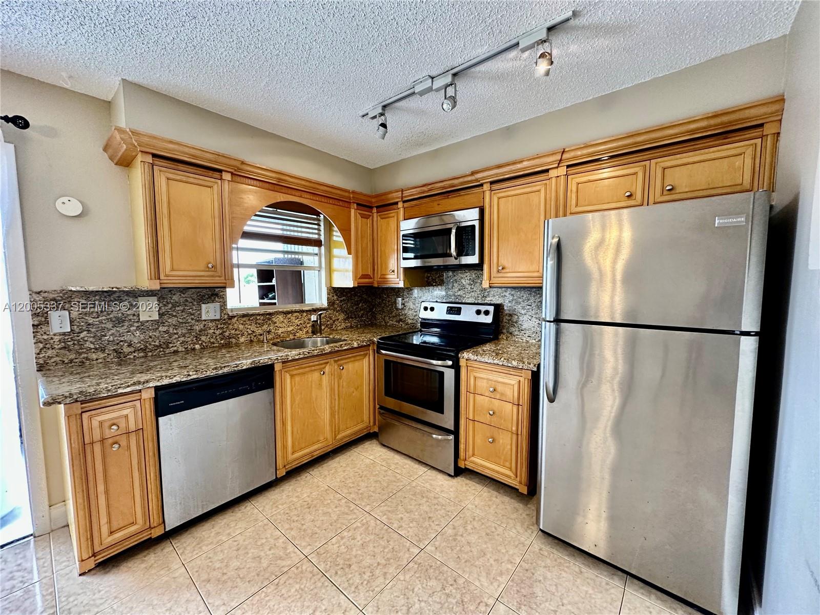 PORTO FINO GARDENS CONDO - Residential