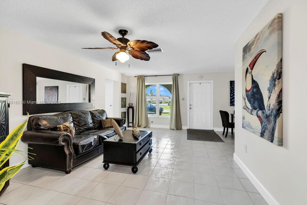 Photo of 8941 NW 25th Ct, Sunrise, FL 33322 (MLS # A11851821)