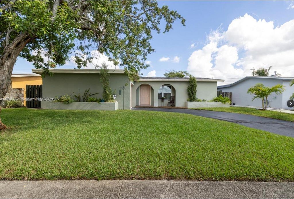 Photo of 8941 NW 25th Ct, Sunrise, FL 33322 (MLS # A11851821)