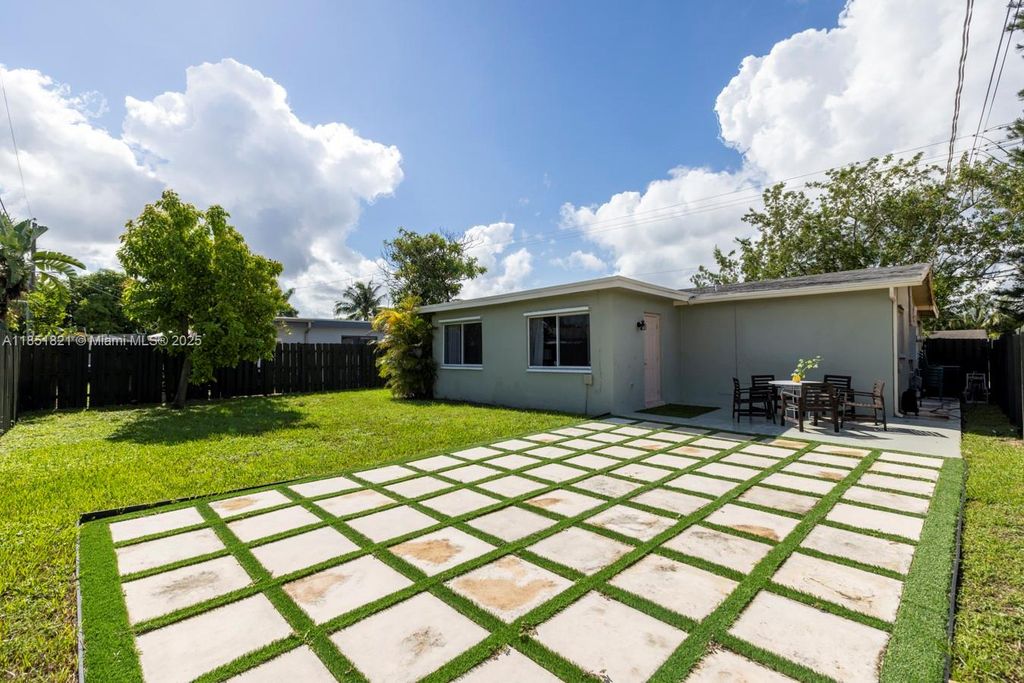 Photo of 8941 NW 25th Ct, Sunrise, FL 33322 (MLS # A11851821)