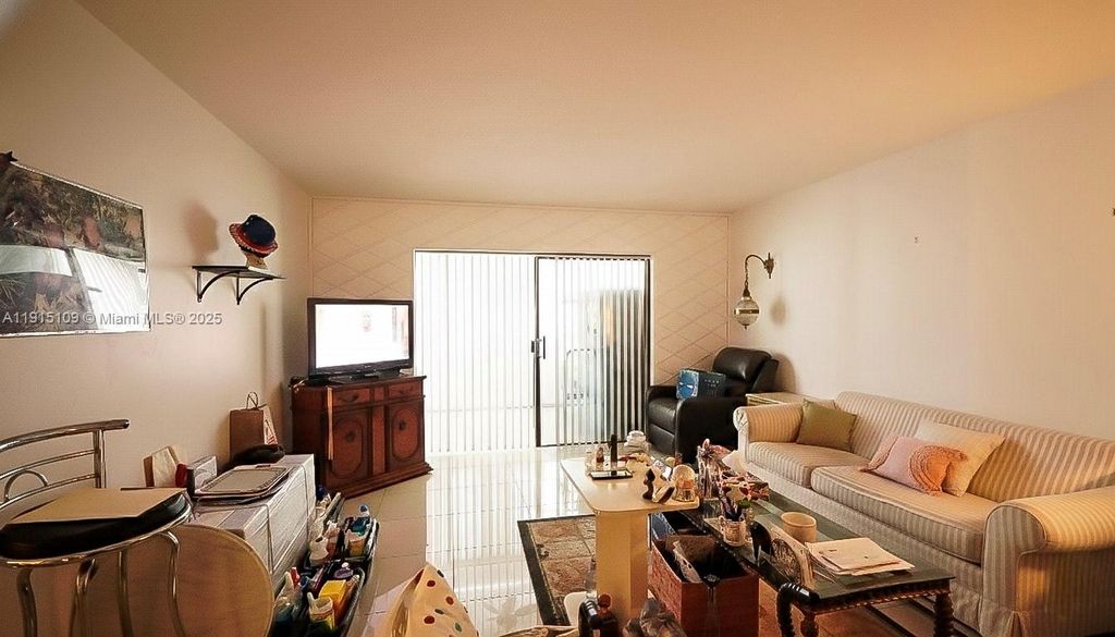 Photo of 3940 NW 42nd Ave #215, Lauderdale Lakes, FL 33319 (MLS # A11915109)