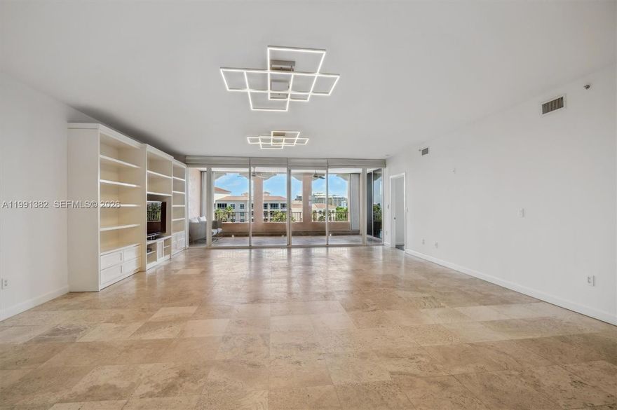 2BD/2.5BA unfurnished condo for rent in Lake Villa II at Ocean Club, Key Biscayne. This bright, spacious unit boasts high ceilings and an open concept living and dining area with custom cabinetry for books, storage, and decor. PH-5 features two balconies: one expansive balcony with breathtaking lake, pool, and city skyline views, and a second with a peaceful garden and distant ocean view. The primary suite overlooks the lake, while the second suite offers serene tree-lined views. Enjoy the exclusivity of Lake Villa II and indulge in Ocean Club’s world-class amenities, including a Beach Club, Tennis Club, gym, restaurants, pools, spa, and more. Includes two parking spaces and storage. Experience resort-style living at its finest! Easy to show - Two parking spaces, one of them with h EV Charger type 2 (220v) and 1 (110v)