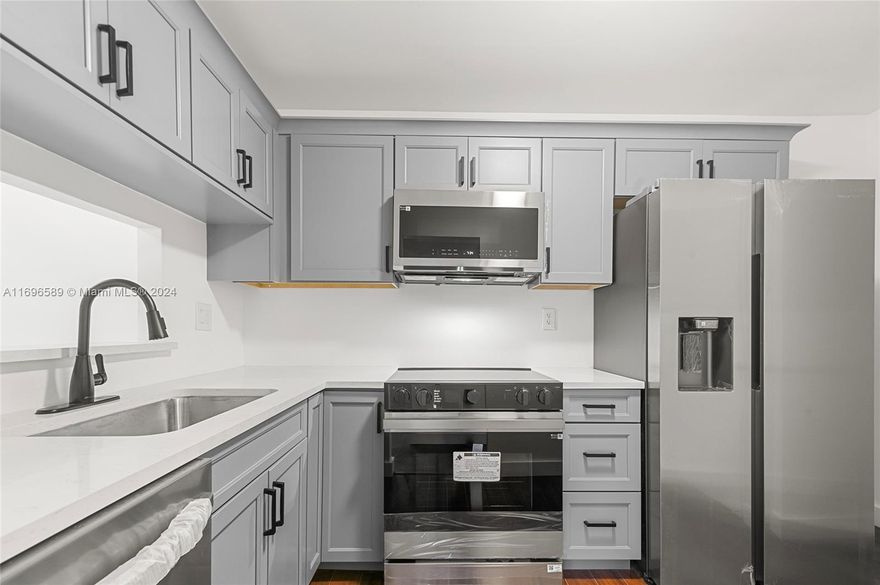 Location, Location, Location! Own a beautifully upgraded condo in the heart of Hollywood, just two blocks from downtown shops and restaurants and minutes from the beach! This move-in ready gem boasts a designer kitchen, sleek modern bathrooms, new flooring, hurricane impact windows, and brand-new stainless steel appliances.

Enjoy the convenience of a covered carport and relax by the community pool. Don’t miss your chance to live or invest in this prime location—schedule your showing today!