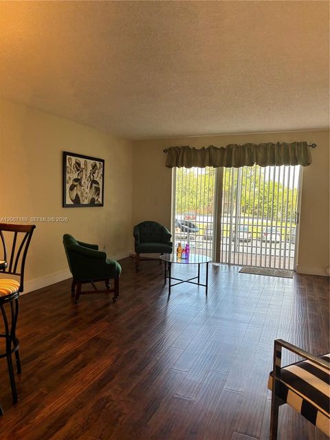 Photo of 3000 E Sunrise Lakes Dr #202, Sunrise, FL 33322 (MLS # A12007189)