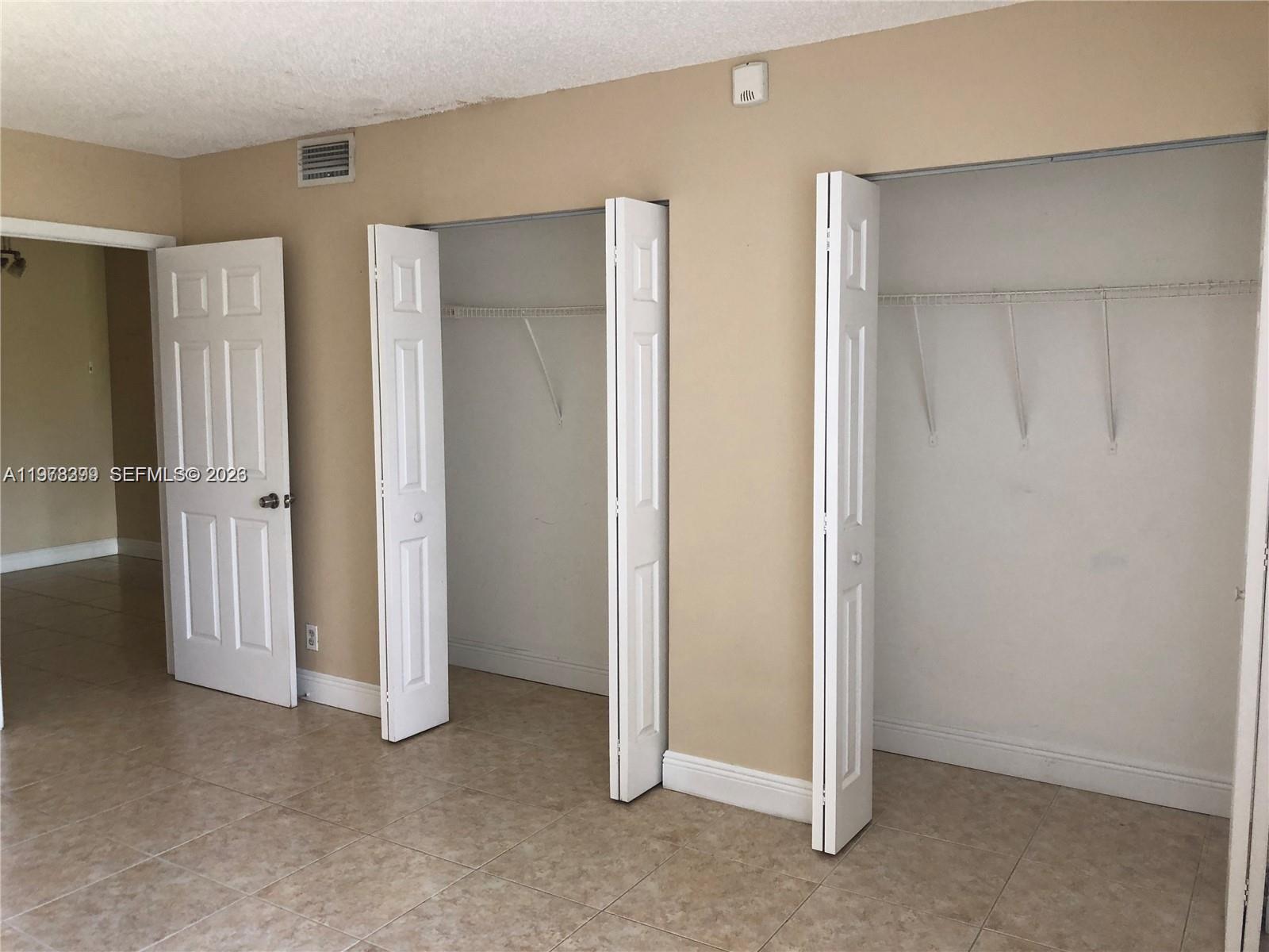 LAKES OF JACARANDA BLDG 1 - Residential Lease