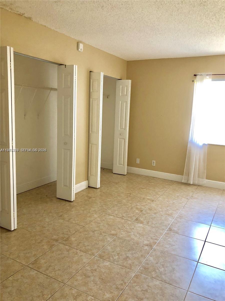 LAKES OF JACARANDA BLDG 1 - Residential Lease