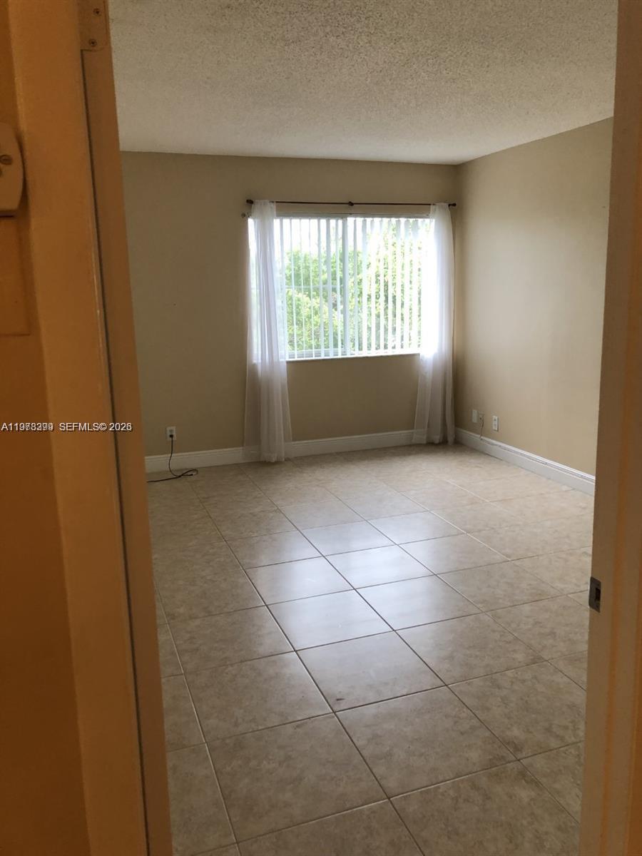 LAKES OF JACARANDA BLDG 1 - Residential Lease