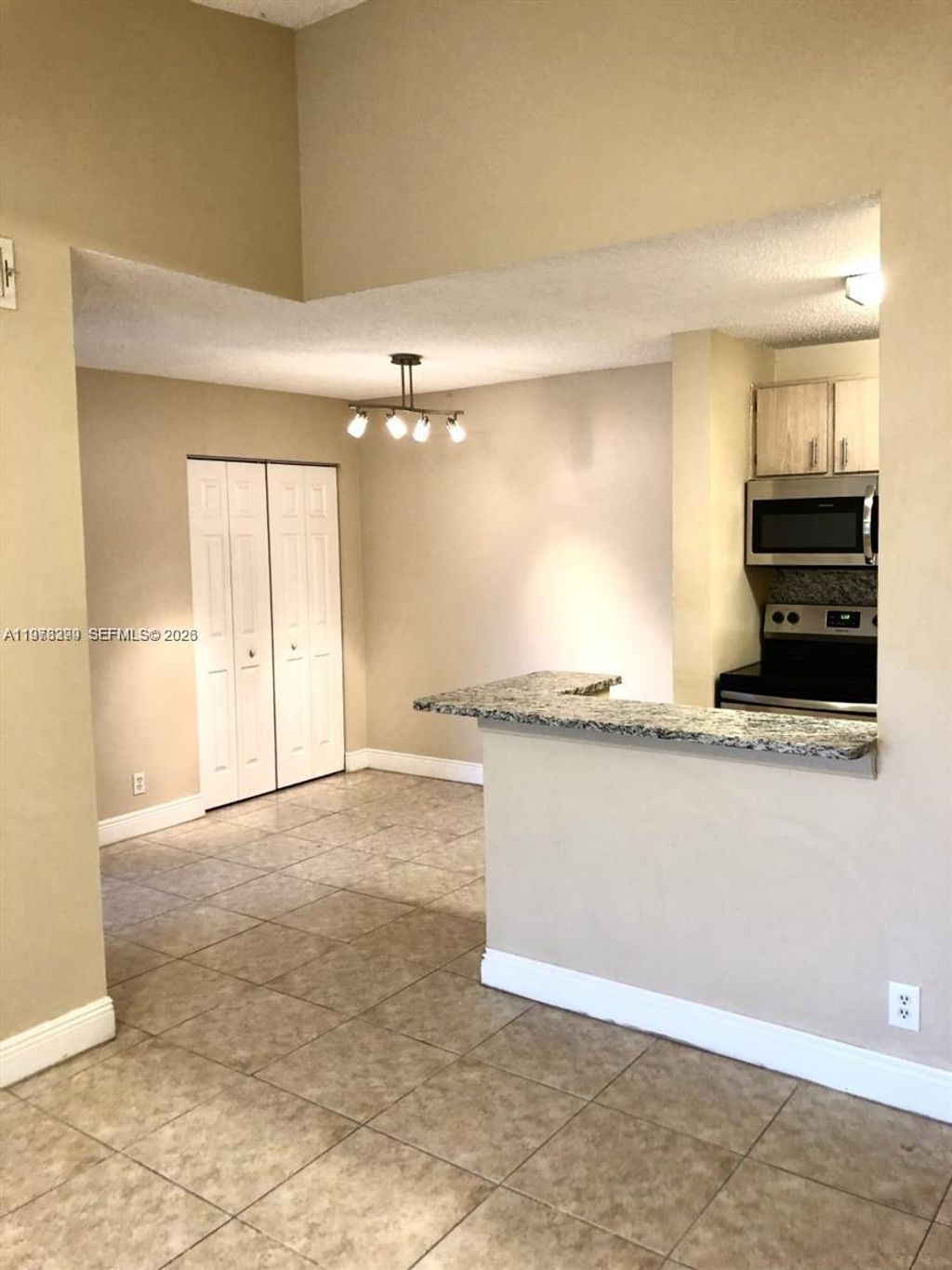 Photo of 10717 Cleary Blvd #303, Plantation, FL 33324 (MLS # A11978399)