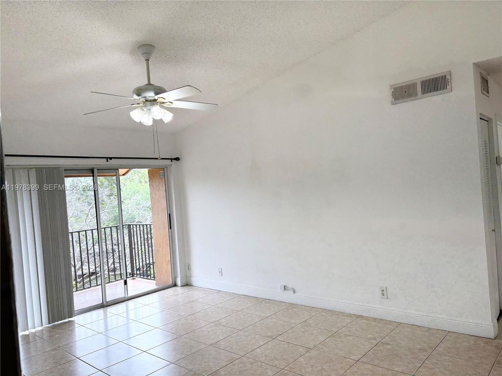Photo of 10717 Cleary Blvd #303, Plantation, FL 33324 (MLS # A11978399)