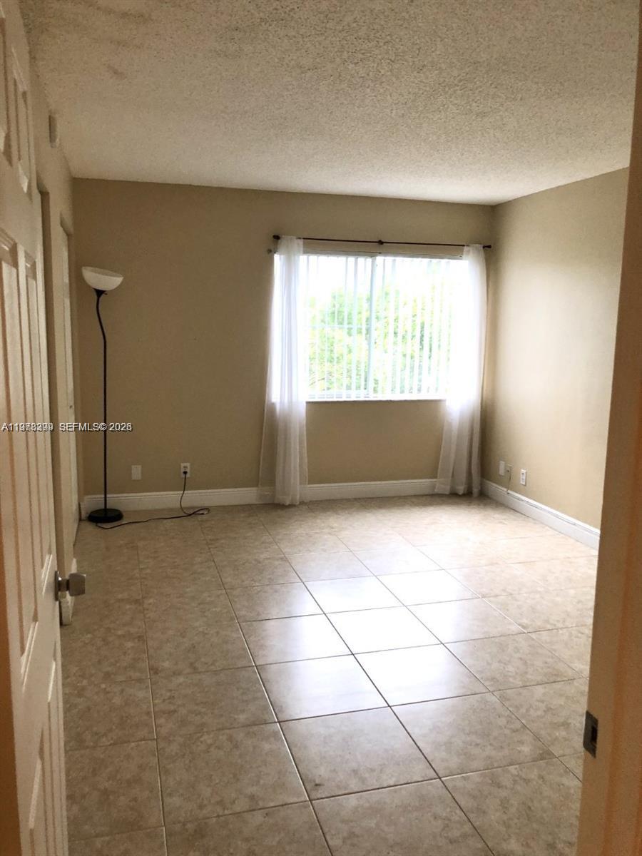 LAKES OF JACARANDA BLDG 1 - Residential Lease