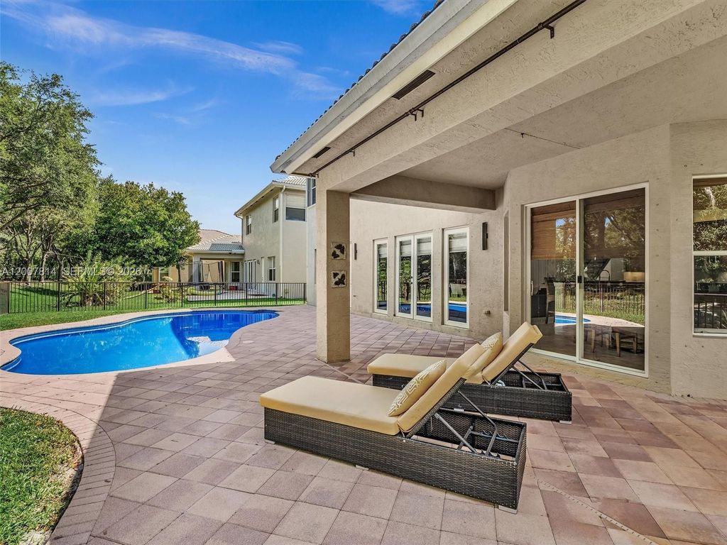 Photo of 4961 SW 173rd Ave, Miramar, FL 33029 (MLS # A12007814)