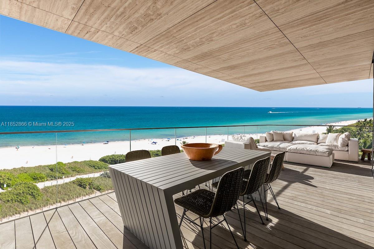 Welcome to ARTE | Surfside No. 402 by Antonio Citterio — a stunning 4-bedroom, 4.5-bath residence offering 5,185 sq ft of refined coastal living. Designed by Antonio Citterio and Patricia Viel, this exclusive enclave of just 16 oceanfront homes boasts sweeping, unobstructed ocean views and a magnificent private terrace perfect for enjoying sunrises and the soothing rhythm of the waves. Private lift access with biometric entry welcomes you into a sanctuary of craftsmanship featuring AXOR Citterio fixtures, Gaggenau appliances, travertine surfaces, and European White Oak flooring. Residents enjoy world-class amenities including rooftop tennis, heated indoor and outdoor pools, direct private beach access, and personalized service, delivering unmatched luxury, privacy, and timeless prestige.