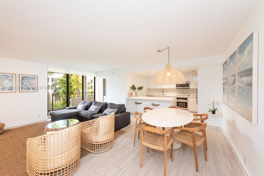 Fully remodeled seasonal rental at Botanica, within the exclusive Key Colony community. 2 bedrooms + ENCLOSED w/ window & balcony access. Beautifully decorated and thoughtfully furnished, it features a spacious living room with comfortable seating and a large TV, an open kitchen with stainless steel appliances, bar with stools, and dining table for 6. The balcony overlooks lush gardens, creating a serene retreat. The master suite includes a walk-in closet, double sinks, and shower; the second bedroom offers two full beds; the den has a twin bed expandable to a queen. Key Colony provides beach access, lap pool, pool bar, gym, playground, market, 24-hour security and more. Seasonal only, 90-day minimum. Winter Nov–Mar $9,000/mo.