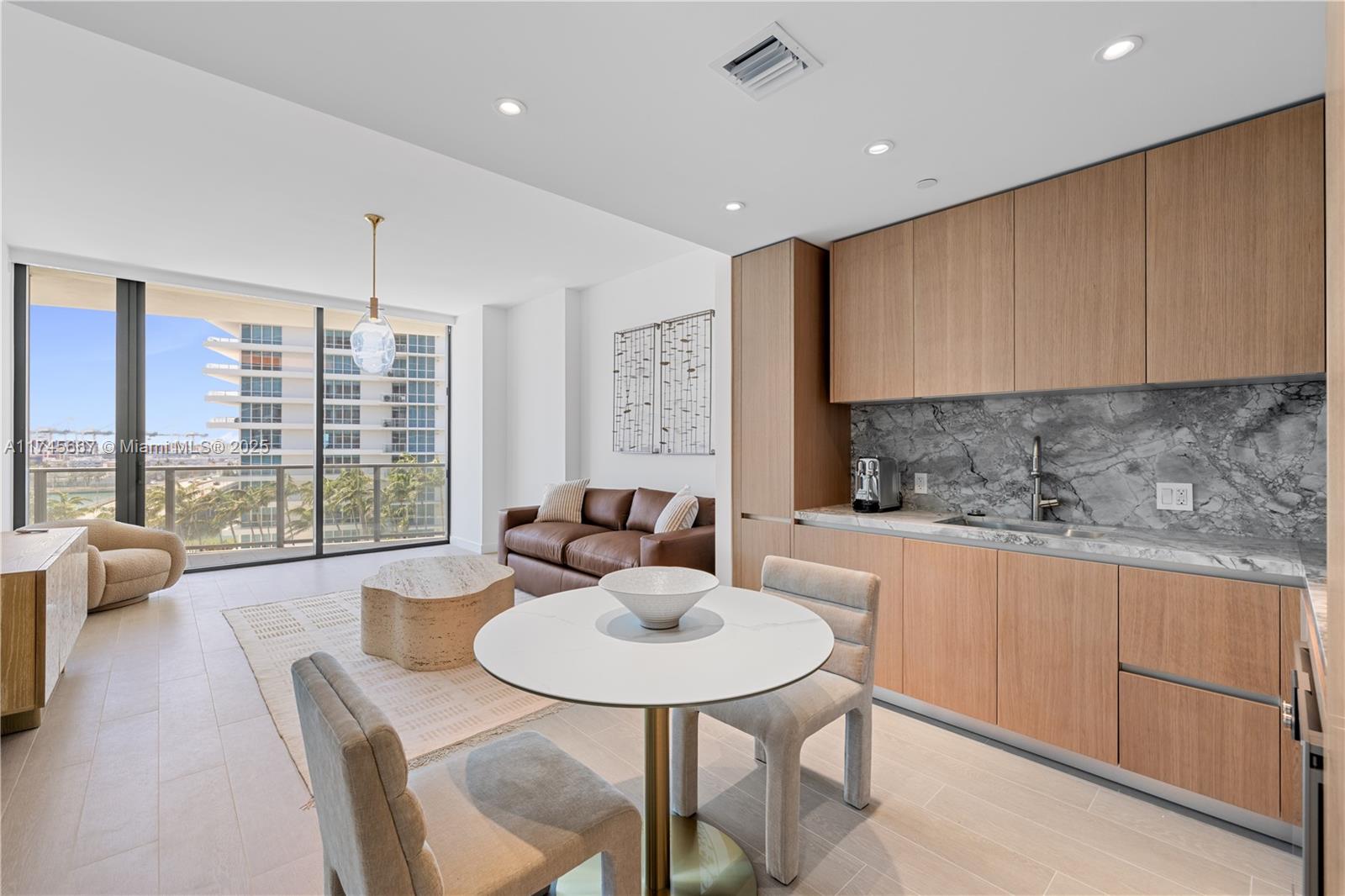 1 VALET PARKING SPACE INCLUDED. CHECK VIRTUAL TOUR IN LINK. Experience unparalleled luxury in this 1-bed, 1.1-bath residence at Five Park Miami Beach, one of only few units in the entire building boasting unobstructed views of Downtown Miami and Brickell. Fully furnished with top-tier designer pieces and custom-made closets, this home offers sophistication and comfort. Residents indulge in world-class amenities, including a resort-style pool with personalized service, poolside Café Flora, co-working spaces, a conference room, Zoom room, cinema, and playrooms for all ages. The state-of-the-art fitness center, sauna, spa, private beach club, and 24/7 concierge service, valet parking, complete this extraordinary living experience. Don't miss the opportunity!