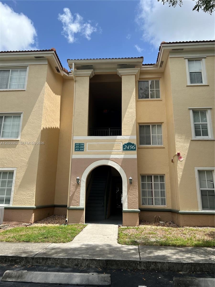 Photo of 2496 Centergate Dr #205, Miramar, FL 33025 (MLS # A12023382)