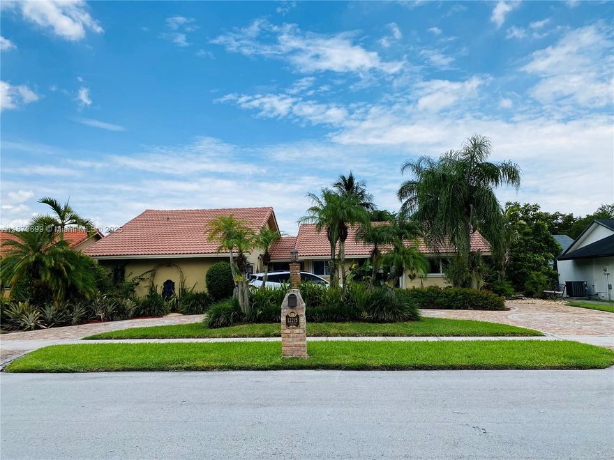 This beautifully appointed home in the well desired Habitat Estates is for any family to truly enjoy an everyday Resort living experience!  Remodeled and nothing has been spared by proud owners! Spacious with Wood /Ceramic /marble floors.  Main house consists of 3 bedrooms  2 baths  Formal Living /Dining, additional eat -in area adjoining Brand New Gourmet Kitchen w/ Stainless/SS appliances , Solid wood doors, Wood Calif Shutters, Steam Bath, shower,  Separate Private 4th bedroom great for guests/Mother in laws! Brand new Salt system Pool/Spa , Gazebo, Wall to wall BBQ /Wine Cooler.  Impact Windows, Professionally Landscaped -Custom Old Chicago Circular driveway and More! A Must See!