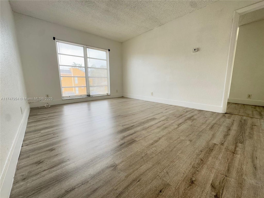 Photo of 4535 Treehouse Ln #F, Tamarac, FL 33319 (MLS # A11747954)