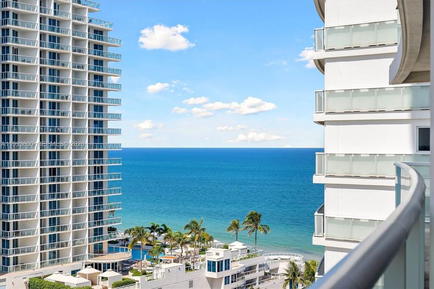 Welcome to your Happy Place! Shows beautifully! Oceanfront and Intracoastal gorgeous views from three balconies! This spacious two bedroom waterfront corner unit beach condo, without neighbors to share wall with,  offers a split floor plan with two ensuite full bathrooms with full size washer and dryer inside. HOA includes everything such as exterior insurance, lobby receptionist, manager on site, all utilities water, electricity, high speed internet, garbage and recycling. Enjoy 5 star resort style amenities, 2 heated swimming pools, spa, gym, valet, 24 hour concierge lobby, private beach service , umbrellas and beach chairs for your exclusive use. Maximum rental flexibility for ideal home that can be your homestead property and financed, options of both hotel management through Marriottor private management through Airbnb, VRBO, etc. One car parking space.