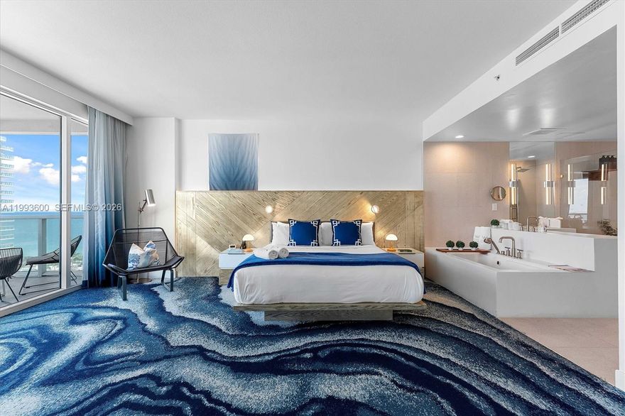 Welcome to your Happy Place! Shows beautifully! Oceanfront and Intracoastal gorgeous views from three balconies! This spacious two bedroom waterfront corner unit beach condo, without neighbors to share wall with,  offers a split floor plan with two ensuite full bathrooms with full size washer and dryer inside. HOA includes everything such as exterior insurance, lobby receptionist, manager on site, all utilities water, electricity, high speed internet, garbage and recycling. Enjoy 5 star resort style amenities, 2 heated swimming pools, spa, gym, valet, 24 hour concierge lobby, private beach service , umbrellas and beach chairs for your exclusive use. Maximum rental flexibility for ideal home that can be your homestead property and financed, options of both hotel management through Marriottor private management through Airbnb, VRBO, etc. One car parking space.