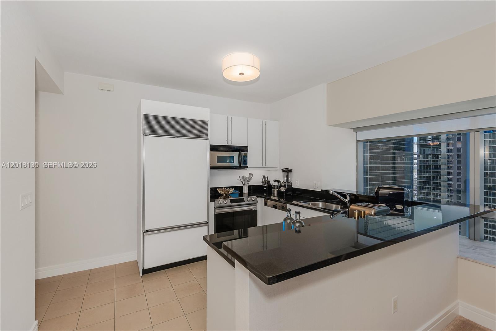 MILLENNIUM TOWER CONDOMIN - Residential