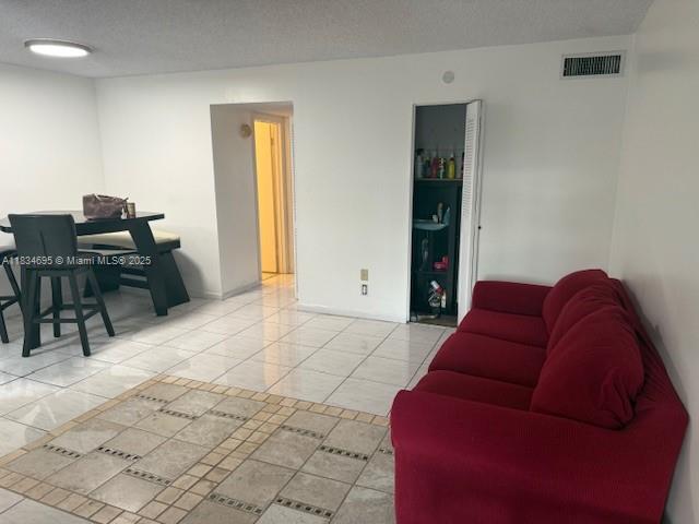 1 Bedroom, 1 1/2 bathroom, open living and dining room and screened-in patio. Condo in East Hollywood Lakes, quiet neighborhood. Huge Community pool with 2 sauna rooms and Club house. Golf course view, New Ac unit in 2024, No age restrictions. Located on golf course, close to beaches, Hollywood Beach Broadwalk, several parks and Hollywood downtown. Short drive to Aventura Mall, 10 minutes to FLL International Airport.