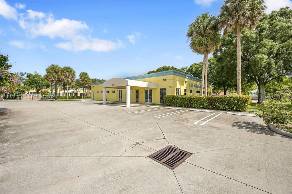 Photo of 5205 Village Blvd, West Palm Beach, FL 33407 (MLS # A11972208)