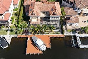 Exquisite Aubuchon-Built Estate | Villa Celona
Over 7,000 sq. ft. of luxury on the Spreader Waterway with direct Gulf access (Chiquita Boat Lock removed). Enjoy western exposure sunsets, infinity-edge pool & spa with panoramic screens, and a new 1,480 sq. ft. dock with 27K lb lift.
Inside, a grand staircase leads to a chef’s kitchen with Sub-Zero, Viking & Wolf appliances, plus formal dining, family & game rooms. Home features 7 en-suite bedrooms, including a private guest suite/flex space over garage. Primary suite boasts expansive balcony overlooking preserve.
Upgrades include new roof, paint, landscaping, impact windows/doors, 3 HVACs (1 new 2024), alarm & surveillance. No HOA—ideal for personal use, luxury rental, or corporate retreat. Offered Turnkey.