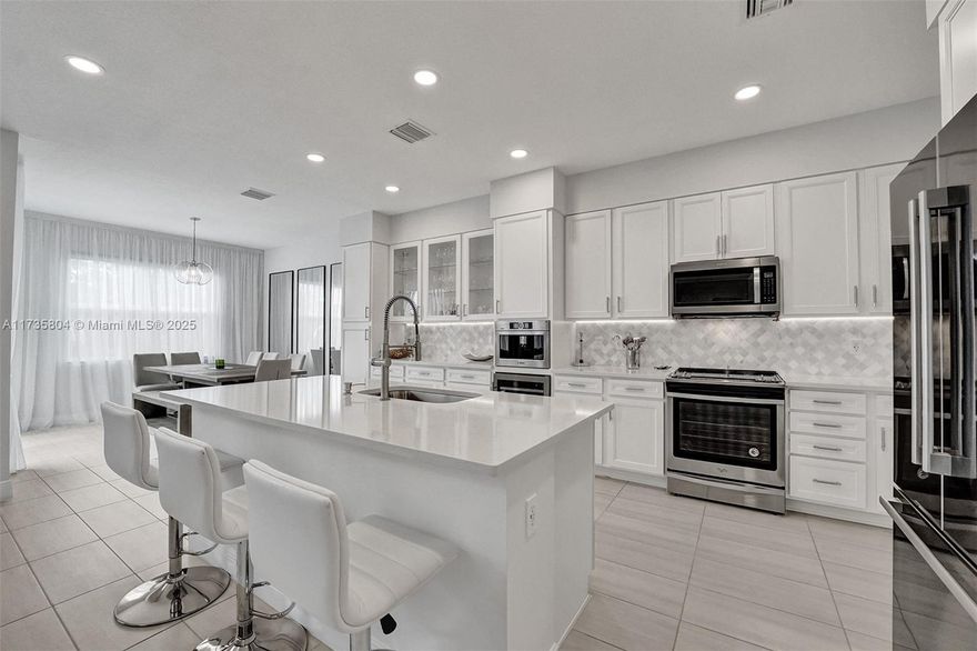 Luxury Waterfront Townhome in Parkview at Hillcrest. Move right into this fully renovated 3-bedroom, 2.5-bath townhome, beautifully furnished with high-end finishes. Enjoy water views and an open-concept design perfect for modern living.Located in a gated community with resort-style amenities, including a clubhouse, fitness center, tennis courts, and BBQ stations. Minutes from Downtown Hollywood, Aventura Mall, and Hollywood Beach, with easy access to I-95.Luxury and location await—schedule your tour today!