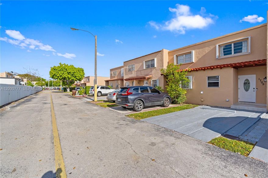 Amazing price! Exceptional and rare opportunity to own a spacious, turn key and move-in ready townhome in highly desirable Villa 56 Condo community in the heart of coveted West Hialeah. This inviting two-story residence has it all! Featuring 2 spacious bedrooms, 1.5 fully remodeled bathrooms, interior laundry room and a private outdoor finished and covered patio, perfect for relaxing or entertaining. Completely remodeled and freshly painted in and out. Beautiful wood plank tiled floors downstairs, European style acrylic cabinets, black Stainless Steel appliances, granite counters and full glass back-splash in the kitchen. Generous formal dinning room. Large living room leading to patio. Home offers both comfort and convenience, including parking steps from front door, along with ample guest parking. Nestled within a private community, residents enjoy a quiet, low-traffic setting with a peaceful atmosphere. Ideally located just blocks from Westland Mall, restaurants and business district. Immediate access to highway and transportation via Palmetto Expressway, I-75, Turnpike and short drive to Amelia Earhart Park. This beautiful home combines accessibility with lifestyle appeal. Perfect as a starter family home and also a very strong addition to any investor’s portfolio, absolutely one of the best values in the area and market currently. A rare opportunity to secure a well-located townhome in one of Hialeah’s most convenient neighborhoods.