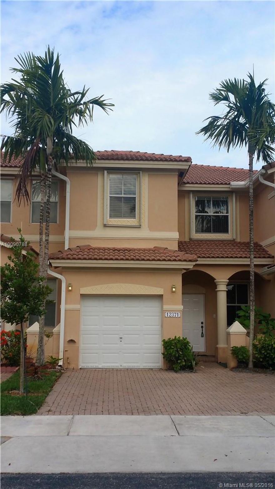 Beautiful 3/2.5 TH with den/office and storage in place of the garage in the highly desirable and family friendly Kendall Breeze! Open floor plan, wood floor tile throughout first floor, new A/C, tankless water heater, freshly painted, stainless steel appliances, walk-in closets, additional pantry space, fenced back yard Walking distance from shopping, schools, dinning, and expressways! Located right off the Florida Turnpike! FANTASTIC LOCATION and ready for new owner.