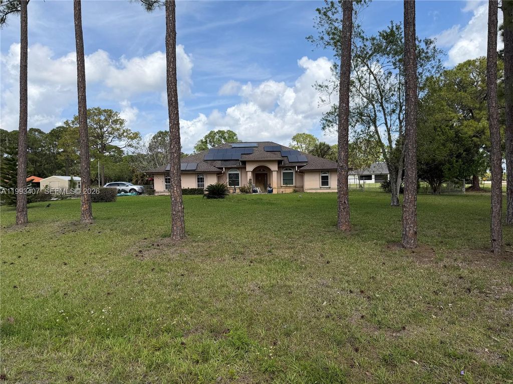 Photo of 9765 Apache Blvd, West Palm Beach, FL 33412 (MLS # A11993407)