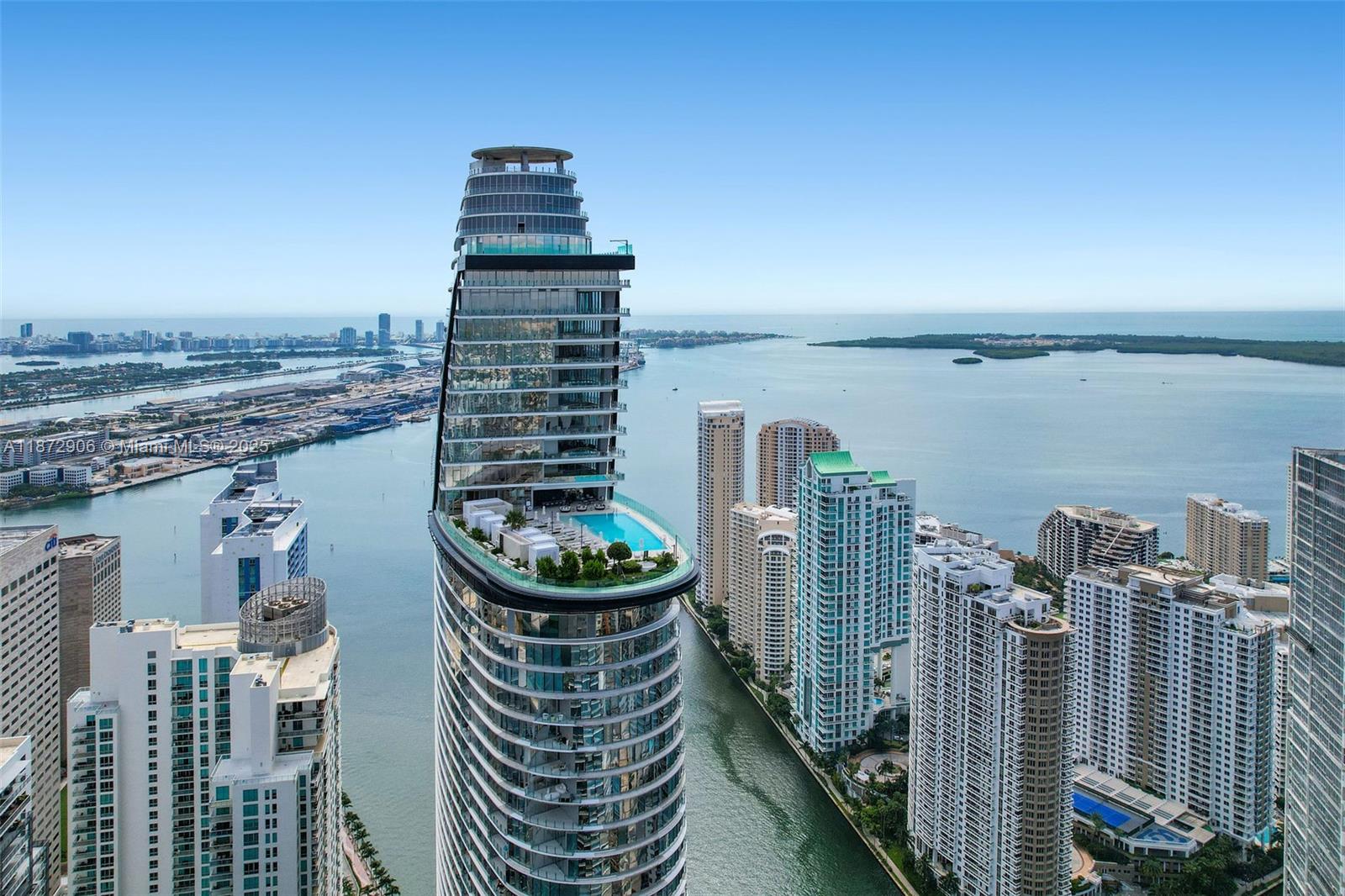 Aston Martin Prestige Signature Penthouse. This Breathtaking, Ultra Luxury, Turnkey One-Story PH is the Epitome of Downtown Miami Brickell Ultra Luxury Living. Featuring over 12,000 s.f. of meticulous, elegant space. 9,000 s.f. of Luxury Interior Living Space encompassing 4 bedrooms, 6 bathrooms, a Staff Room, Fitness Studio, a Dry Bar, a Butler Pantry, and over 3,300 s.f. wraparound terrace with a Private Bradford Pool. Specialty-designed Luxury, Custom-made Furniture, and Artwork adorn this luxury Turnkey Masterpiece. Unparalleled views of the Miami Skyline, the Atlantic Ocean, and Biscayne Bay grace this Gem. Aston Martin Residences features an Art gallery, Infinity Pool, Luxury Spa, Fitness Center, a Butler Service, and a Super Yacht Marina for sophisticated buyers.