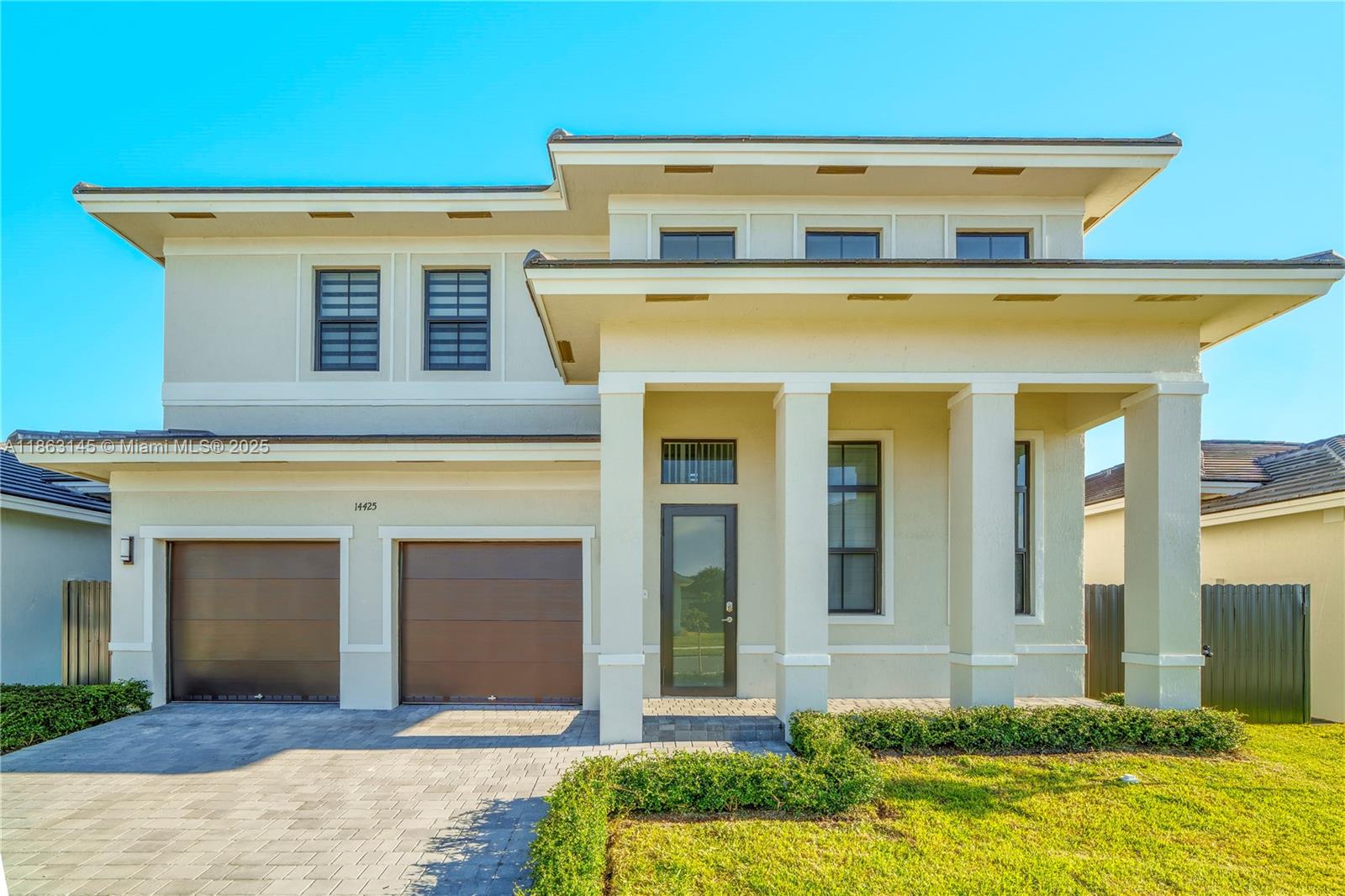 Exquisite new residence in a prestigious neighborhood. This remarkable home showcases an open-concept design with soaring ceilings and expansive impact windows, filling the interiors with natural light. Featuring 5 spacious bedrooms and 4 elegantly appointed bathrooms, it offers both comfort and sophistication. The gourmet kitchen is adorned with granite countertops, premium stainless steel appliances, and seamlessly connects to the grand living area—ideal for refined entertaining. The main level includes a guest suite with full bath for added convenience. Upstairs, the luxurious primary suite boasts two walk-in closets and a spa-inspired bathroom. Outdoors, a generous patio and manicured lawn create the perfect setting for relaxation and gatherings.