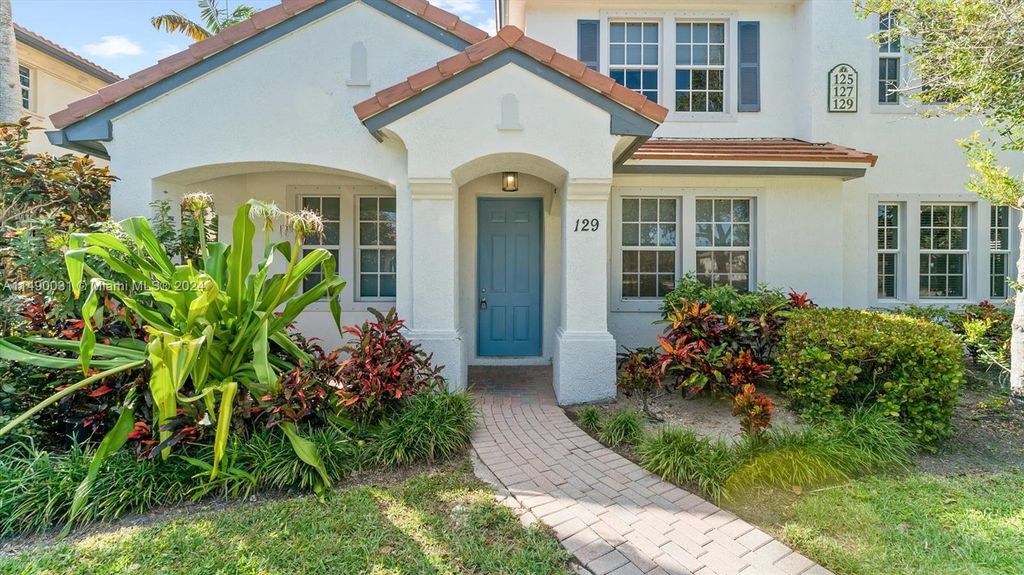 Photo of 129 Evergrene Pkwy #129, Palm Beach Gardens, FL 33410 (MLS # A11490031)