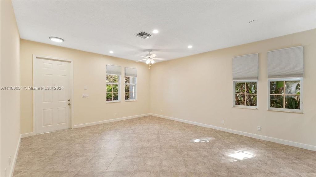 Photo of 129 Evergrene Pkwy #129, Palm Beach Gardens, FL 33410 (MLS # A11490031)