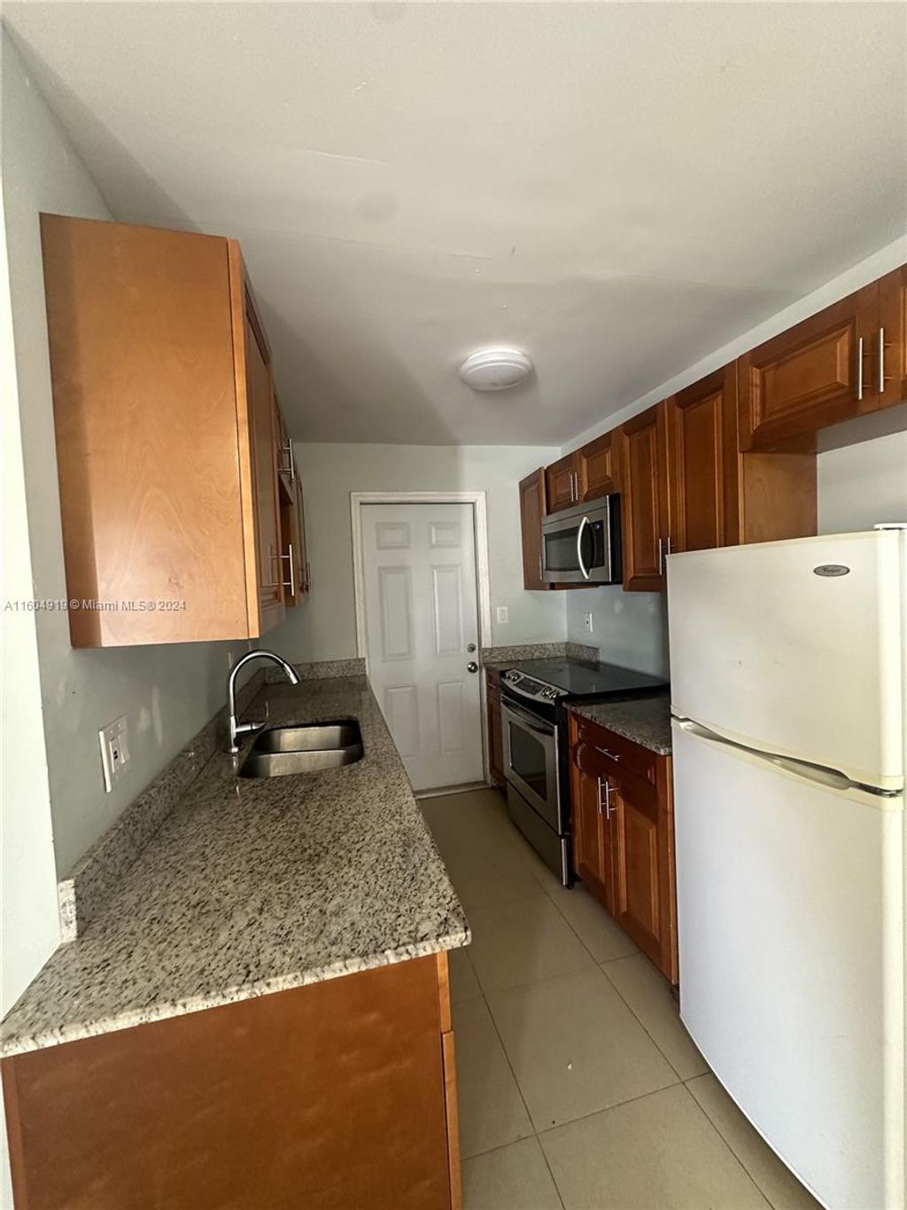 Photo of 716 NW 14th Way #A, Fort Lauderdale, FL 33311 (MLS # A11604919)