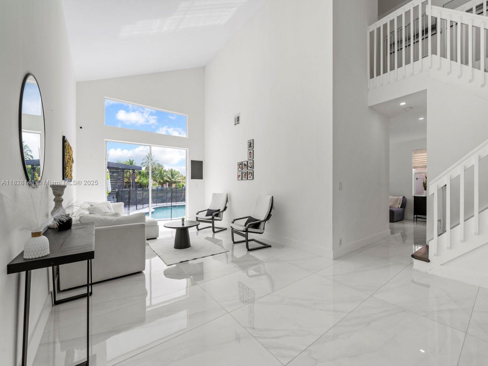 Welcome to this breathtaking 3 bed, 2.5 bath home in Towngate. Enjoy the beautiful water views from the moment you step inside. This home boasts marble + waterproof vinyl floors, a sleek kitchen with quartz countertops & dark SS appliances, vaulted ceilings, a mud room, custom closets, ample storage space, & a 2-car garage. The primary bedroom has generous floor space along with lake views, a large custom walk-in closet, & dual vanity sinks. Second bedroom also has a walk-in. A luxurious pool deck awaits you in the backyard, featuring 2 pergolas with recess lighting + fans - perfect for relaxing & entertaining. Clusia lines the backyard for an added touch of privacy & lush greenery. Great community amenities. Central location right off I-75 surrounded by excellent restaurants & shopping.