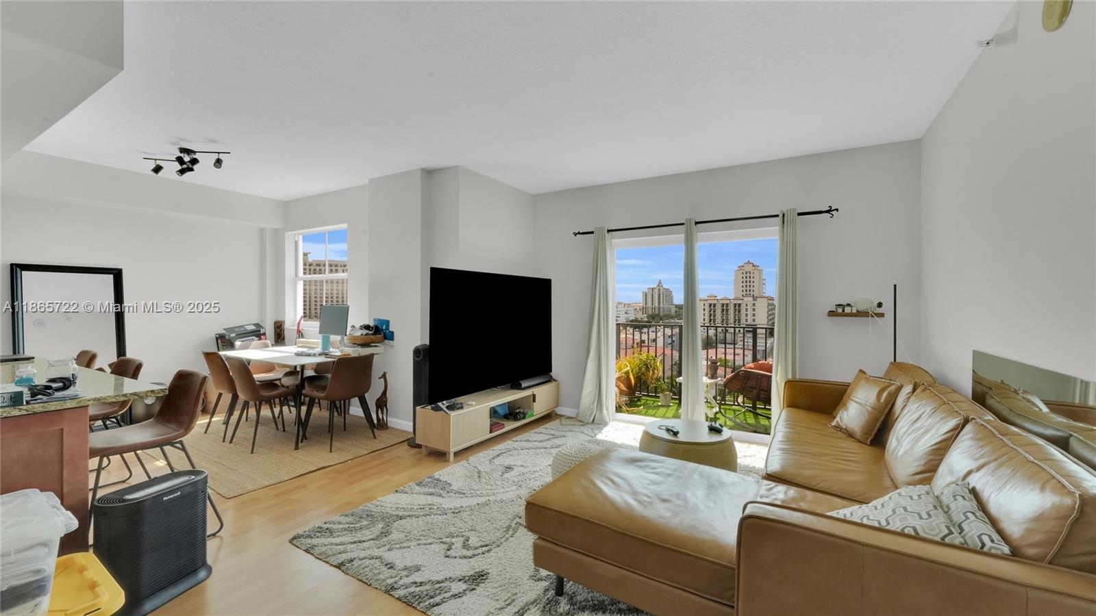 Modern 1 bed, 1.5 bath condo featuring in-unit laundry, stainless steel appliances, and a spacious open layout. The primary suite offers a private bath, plus an additional half bath for guests. Enjoy resort-style amenities including a pool, gym, BBQ area, and club room. Conveniently located near shopping, dining, and entertainment, this condo offers both comfort and lifestyle.