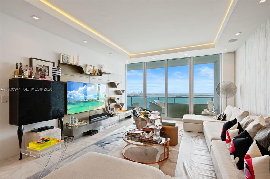 Beautifully remodeled in 2018, this high-floor residence at Jade Brickell offers sweeping views of Biscayne Bay and the Miami skyline. Featuring a custom kitchen with sleek cabinetry, premium appliances, modern countertops, and elevated finishes throughout. The open-concept layout is filled with natural light and designed for effortless living and entertaining. Spacious bedrooms, spa-style bathrooms, and ample closet space complete the interior.Jade Brickell delivers an elevated lifestyle with a spa, modern fitness center, racquetball court, infinity pool, and elegant residents’ lounge, along with 24-hour concierge and valet services. Waterfront setting on Brickell Bay Drive, moments from top-tier dining, shopping, and all Brickell has to offer.