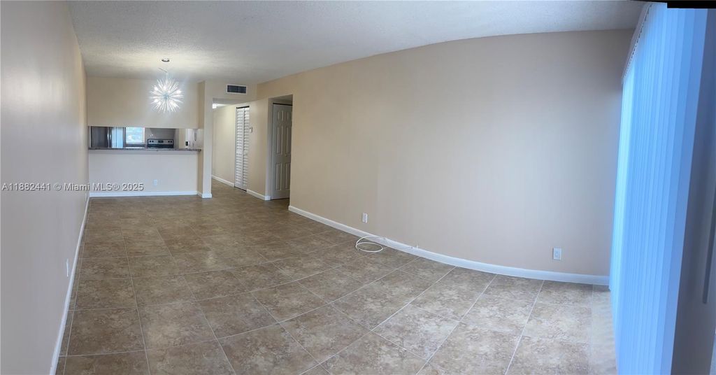 Photo of 8600 N Sherman Cir #203, Miramar, FL 33025 (MLS # A11882441)