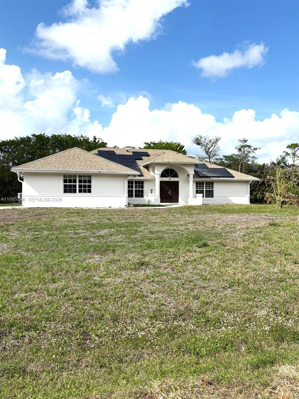 Photo of 16613 N 61st Pl N, Westlake, FL 33470 (MLS # A11995346)