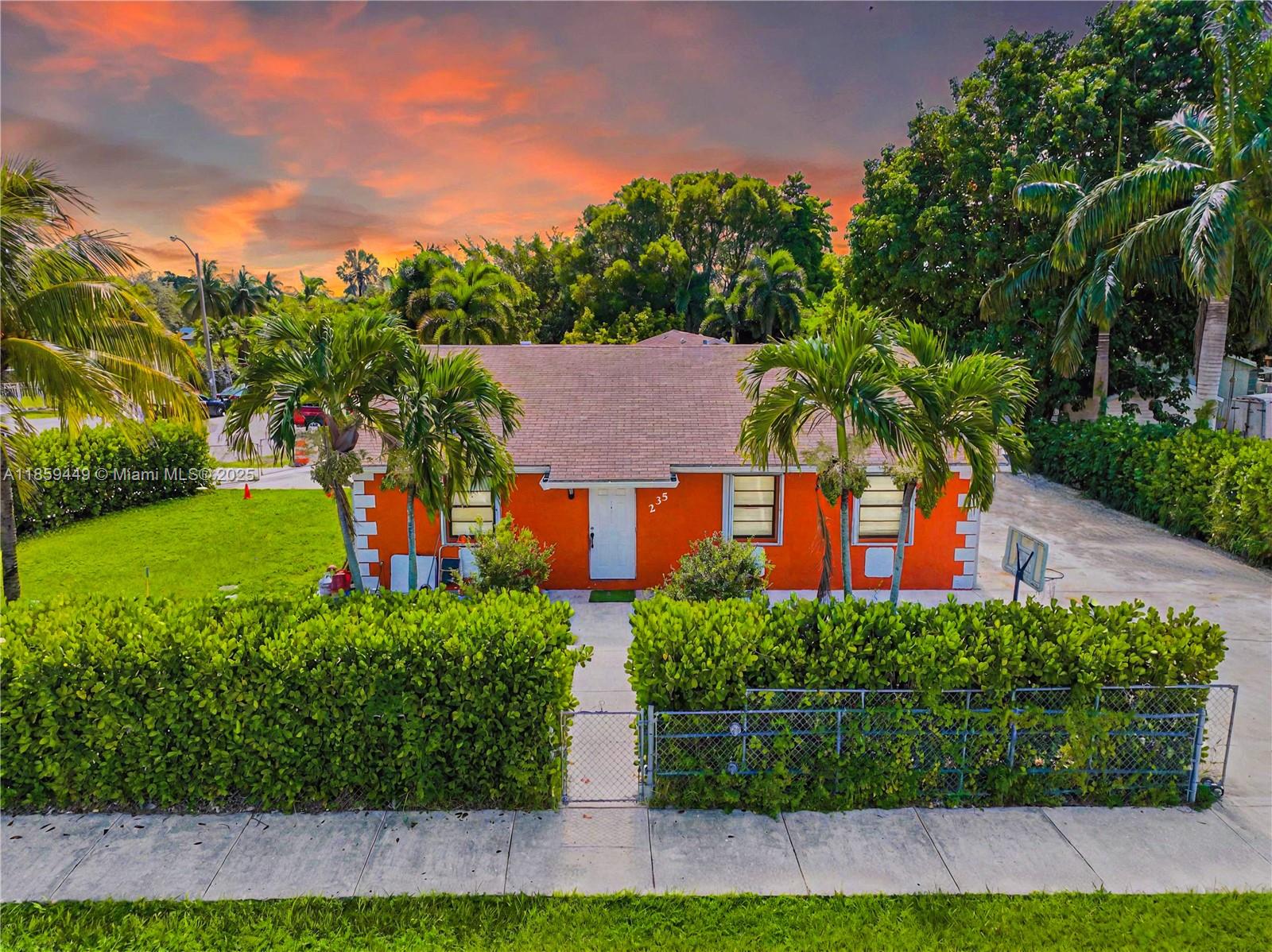 Welcome to this charming single-family home in the desirable Avocado Villas, offering 4 bedrooms and 2 bathrooms on an oversized 7,947 sq. ft. corner lot. Ideal for first-time buyers or investors, this property features a flexible floor plan with characteristics of a duplex, multiple driveways, and even a kitchenette, providing excellent multi-family potential. Highlights include lush Clusia landscaping surrounding the home, an RV-ready driveway with plumbing hookup, and a spacious backyard with room for a pool, boat, or RV parking. Conveniently located near Krome Ave, US-1, the Florida Turnpike, and just minutes from the Florida Keys. NO HOA! Enjoy the immersive 3D Virtual Tour. May the Force be with you!